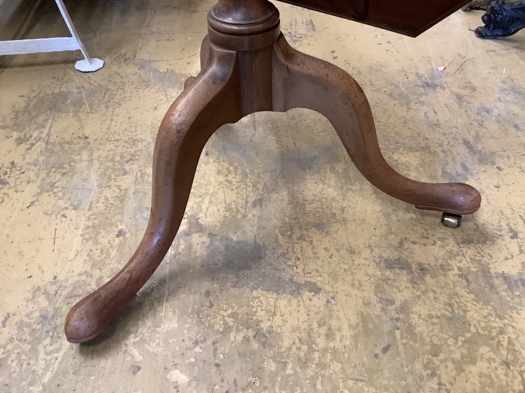 Two similar George III parquetry inlaid mahogany octagonal tilt top tables, width 96cm, height 73cm